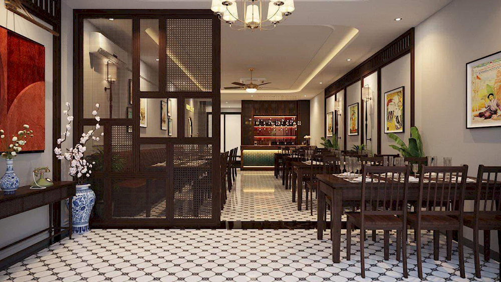 The restaurant offers a cozy atmosphere with elegant Indochina-style decor